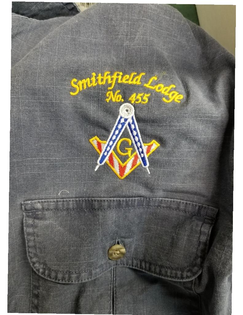 Smithfield lodge logo on button shirt embroidered by Texas Embroidery & Screen Printing